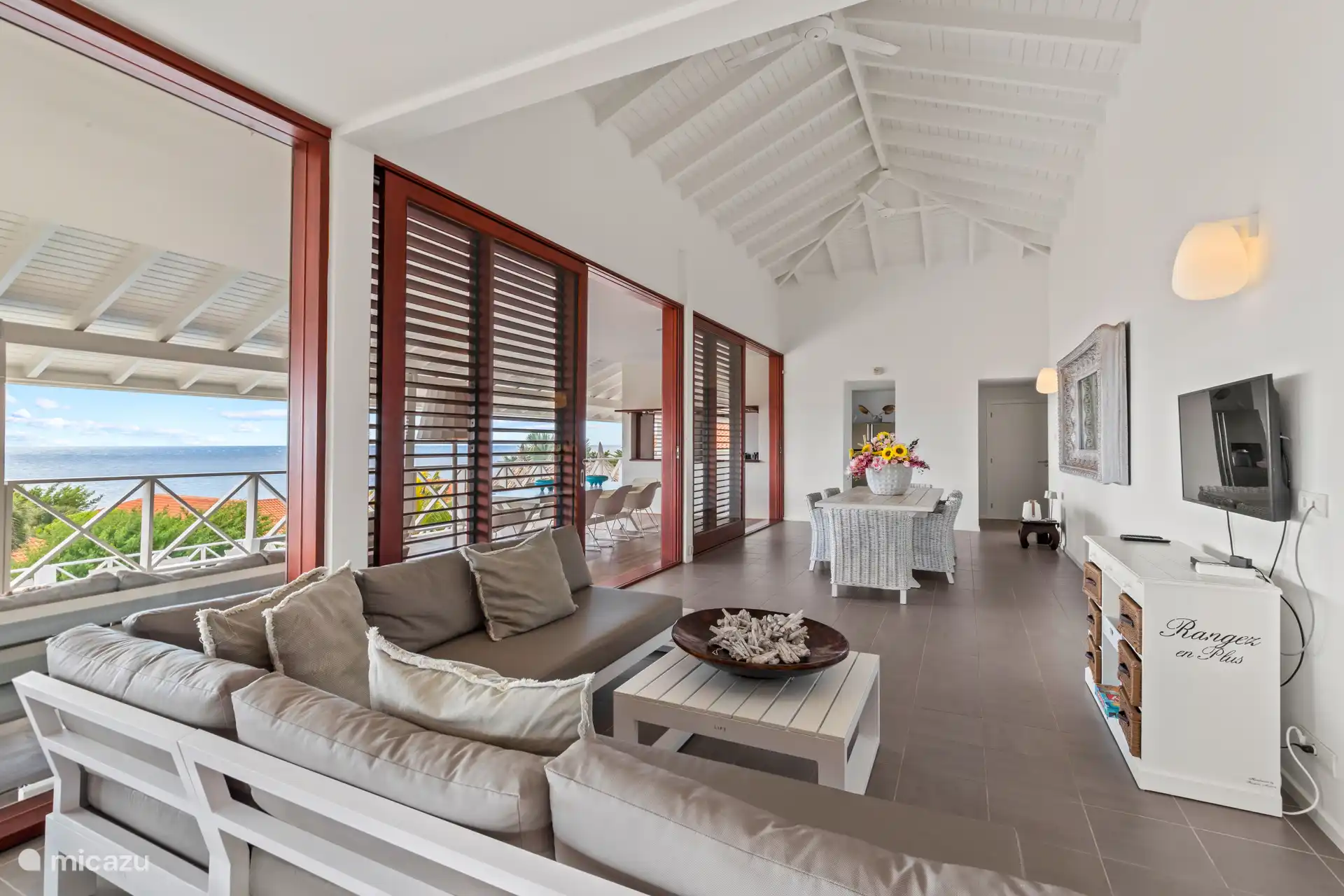 Cozy living room with sitting area and dining table