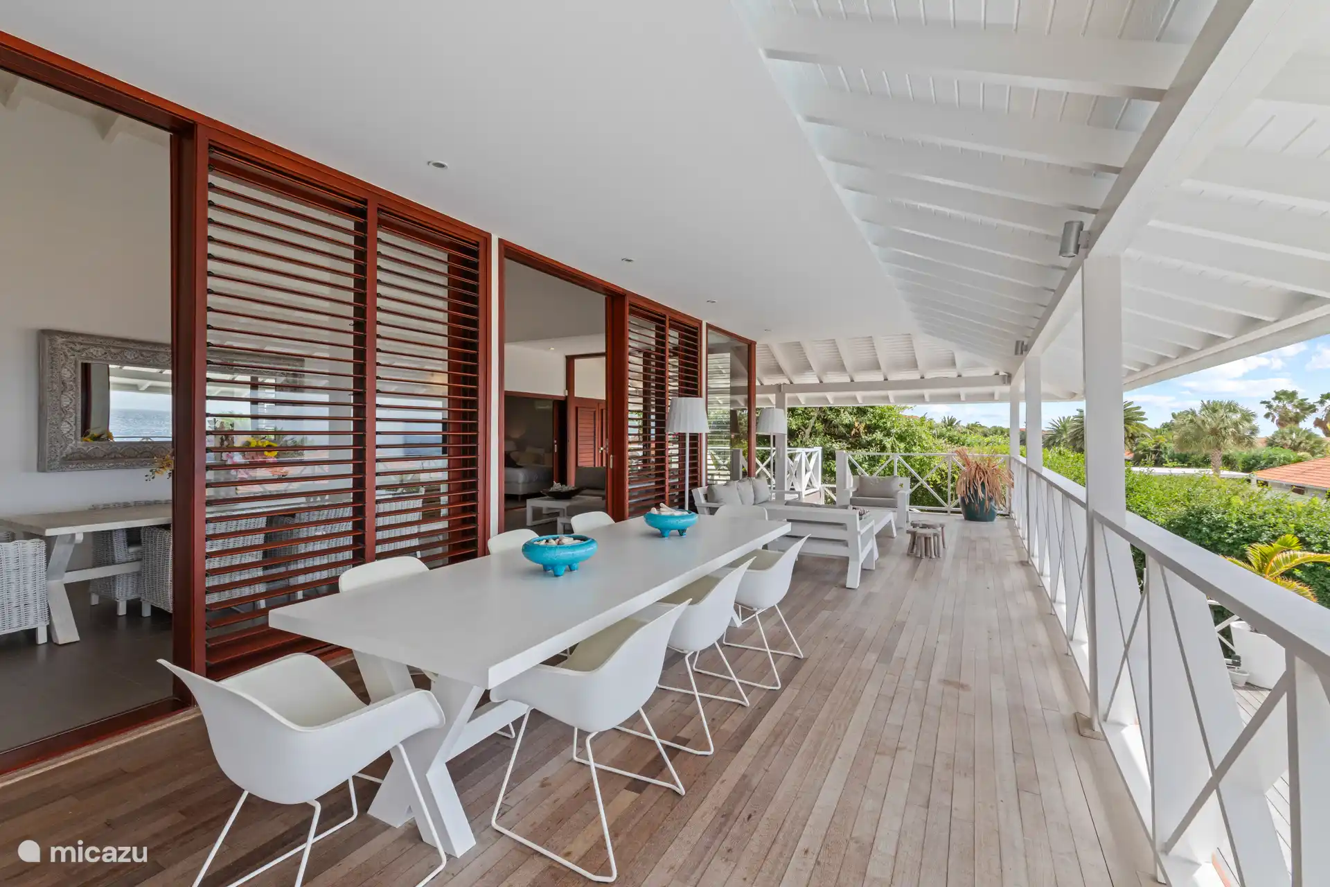 Dining table and lounge set on the terrace