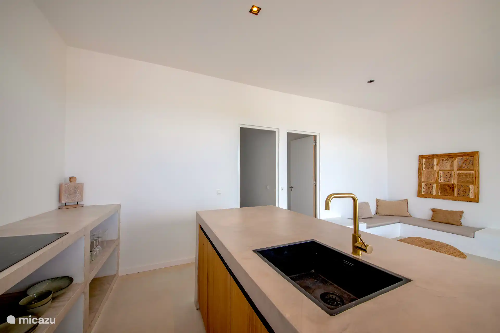 Kitchen fully equipped with crockery, fridge, Nespresso and cooking utensils.