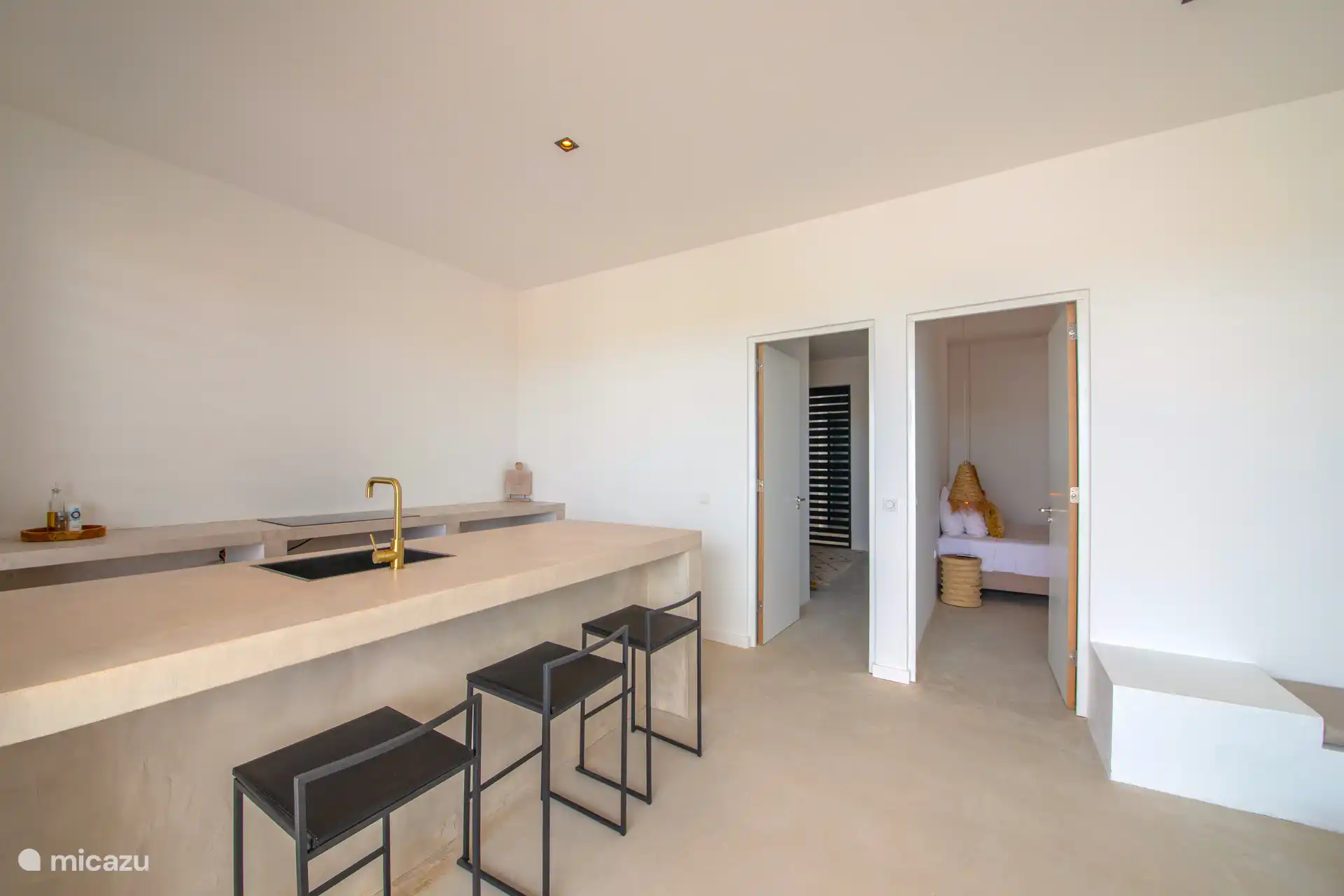 Kitchen fully equipped with crockery, fridge, Nespresso and cooking utensils.