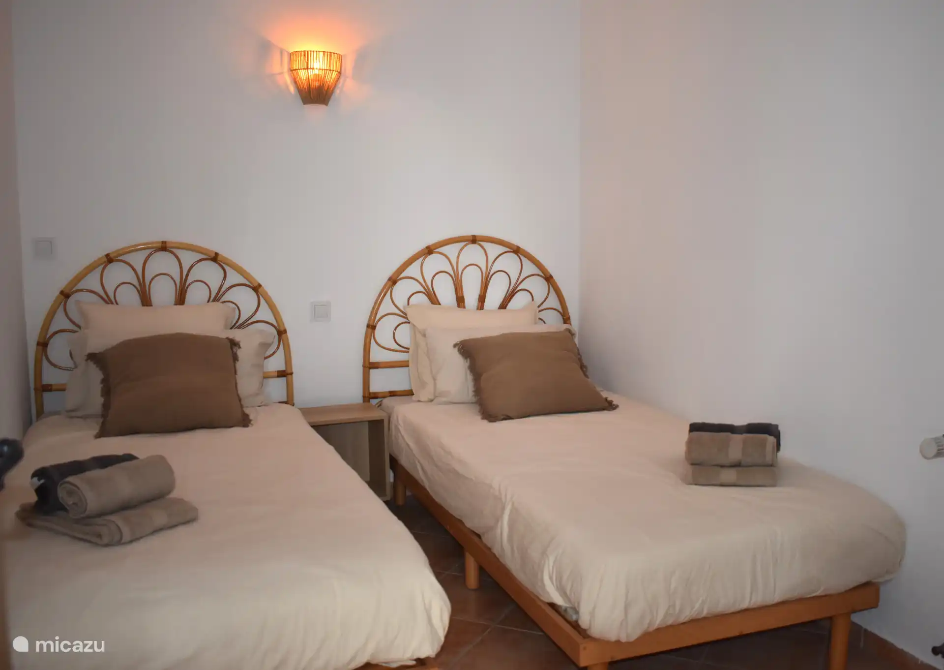 Das dritte Schlafzimmer verfügt über zwei Einzelbetten und hat eine ruhige, gemütliche Atmosphäre.