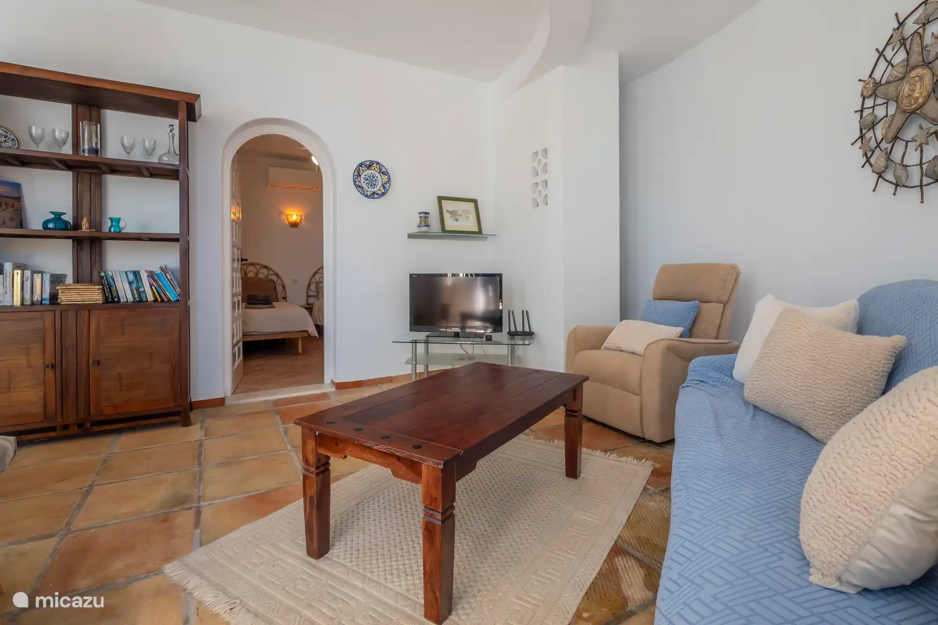 Im Erdgeschoss findest du ein weiteres Wohnzimmer.