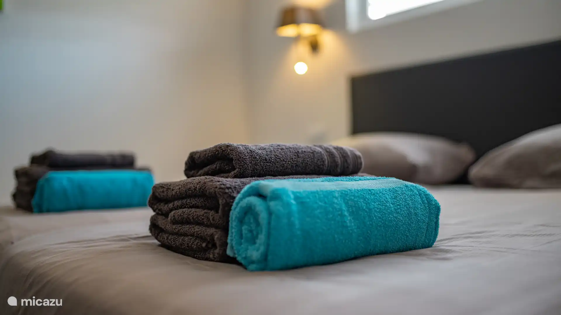 Inklusive Bettwäsche und Handtücher