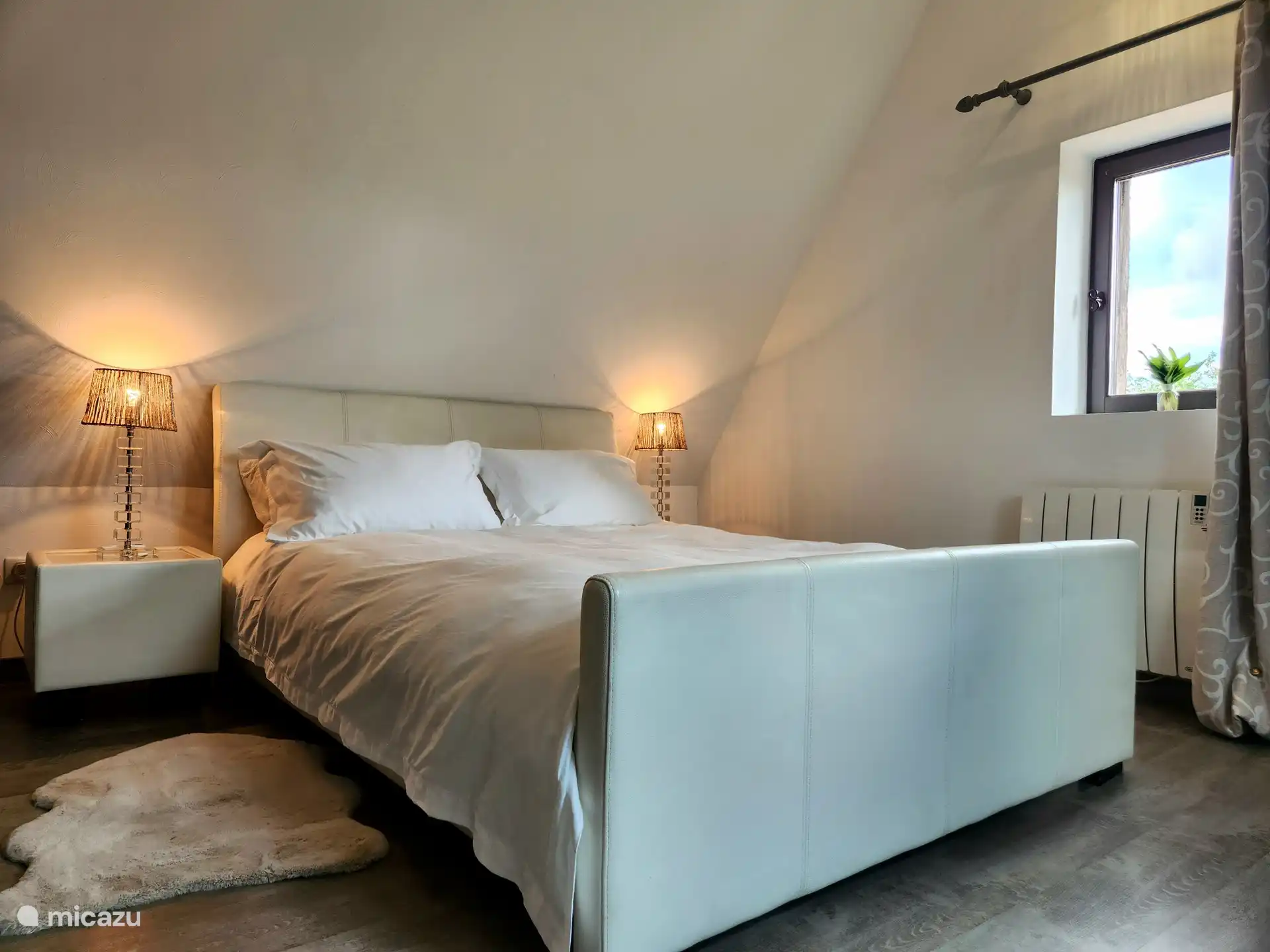 2-Bett-Ferienhaus Schlafzimmer 1 mit Doppelbett