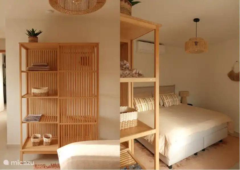 Dormitorio 1 con baño privado, cama de somier con topper y armario