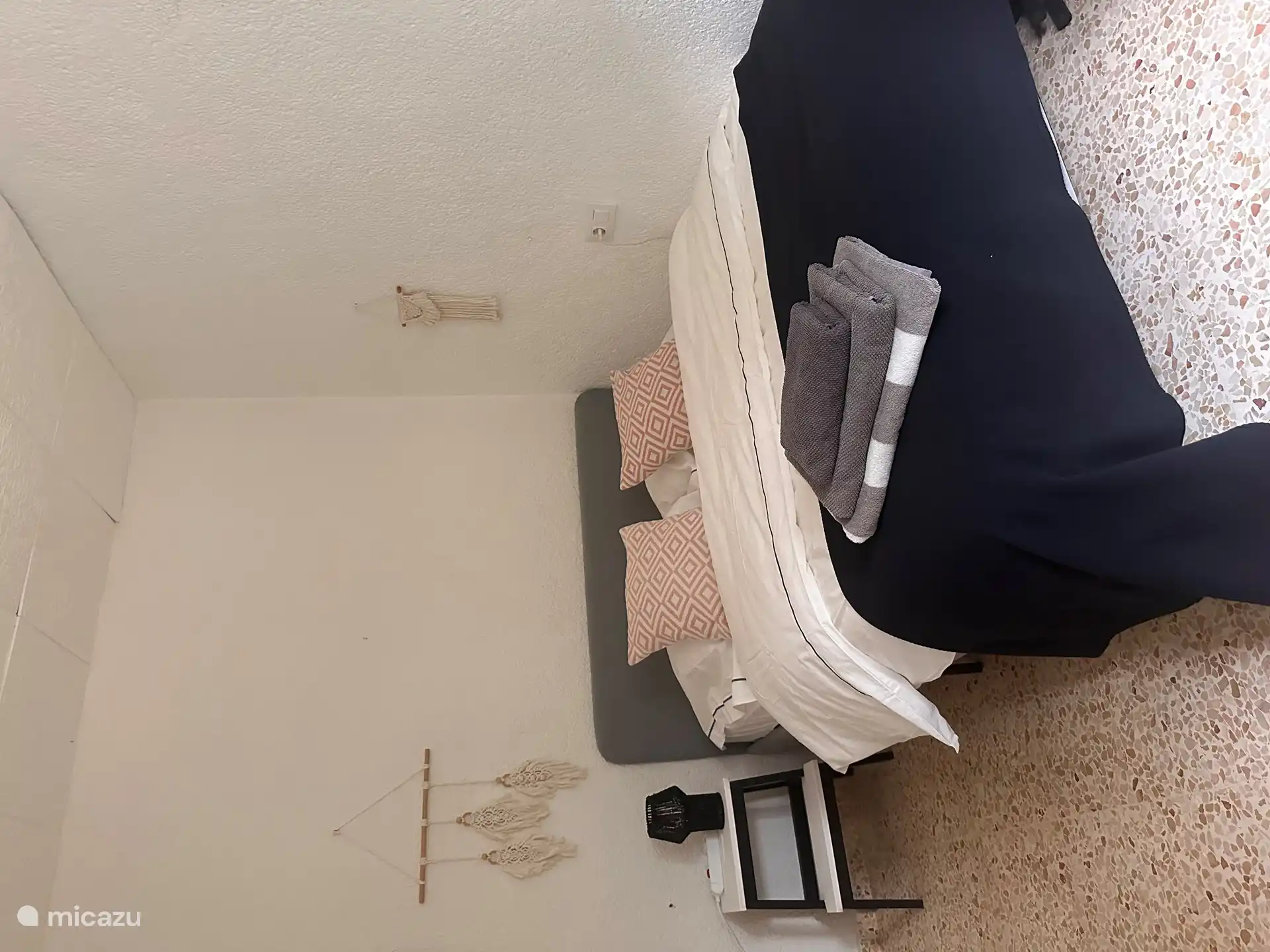 Bedroom 2. The bed is 140x200 cm. It can sleep 2 children or 1 adult. This room has a desk and a large wardrobe.