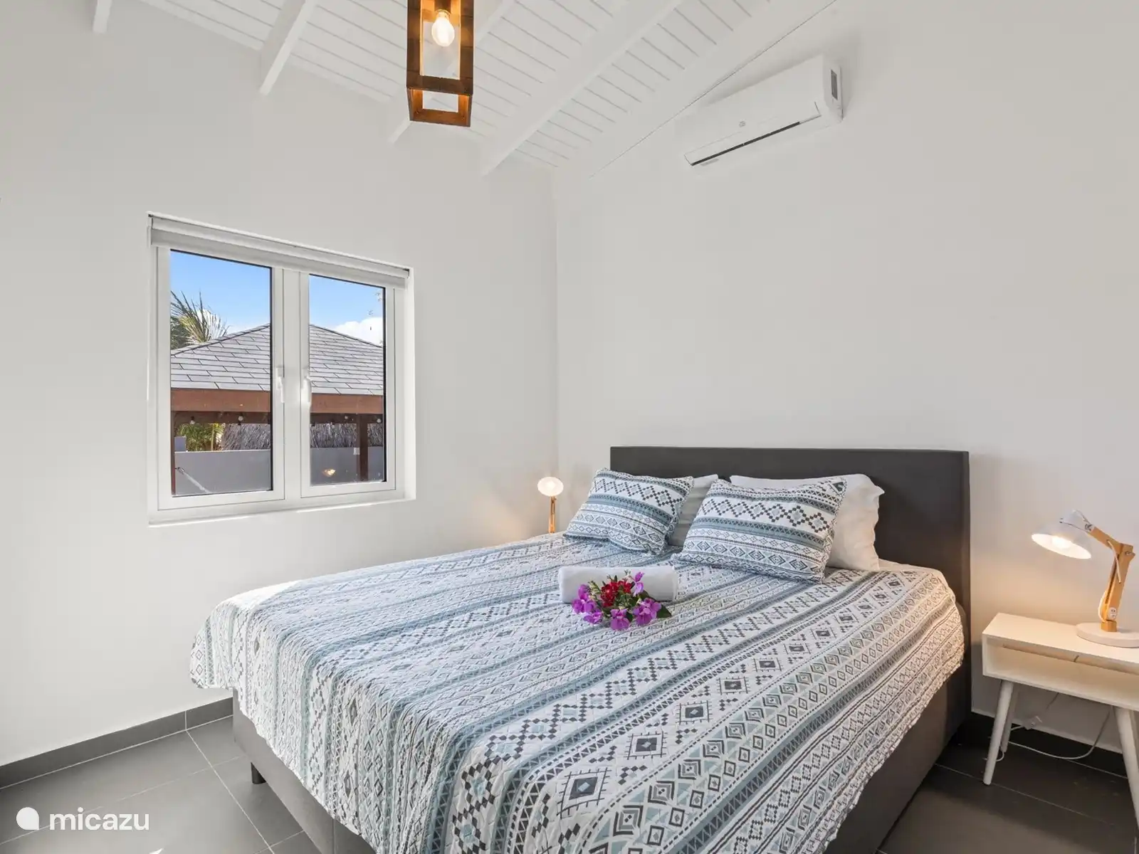 Bedroom with a double bed and TV