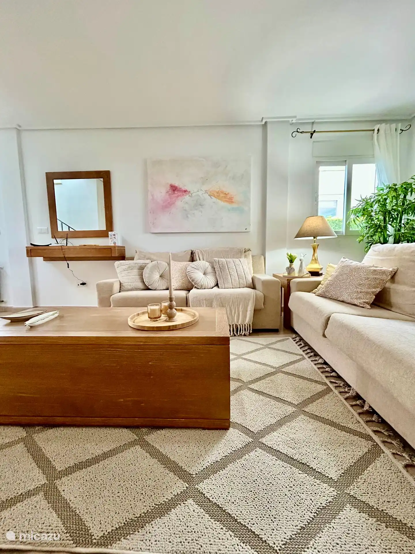 The spacious living room also features sofa beds.