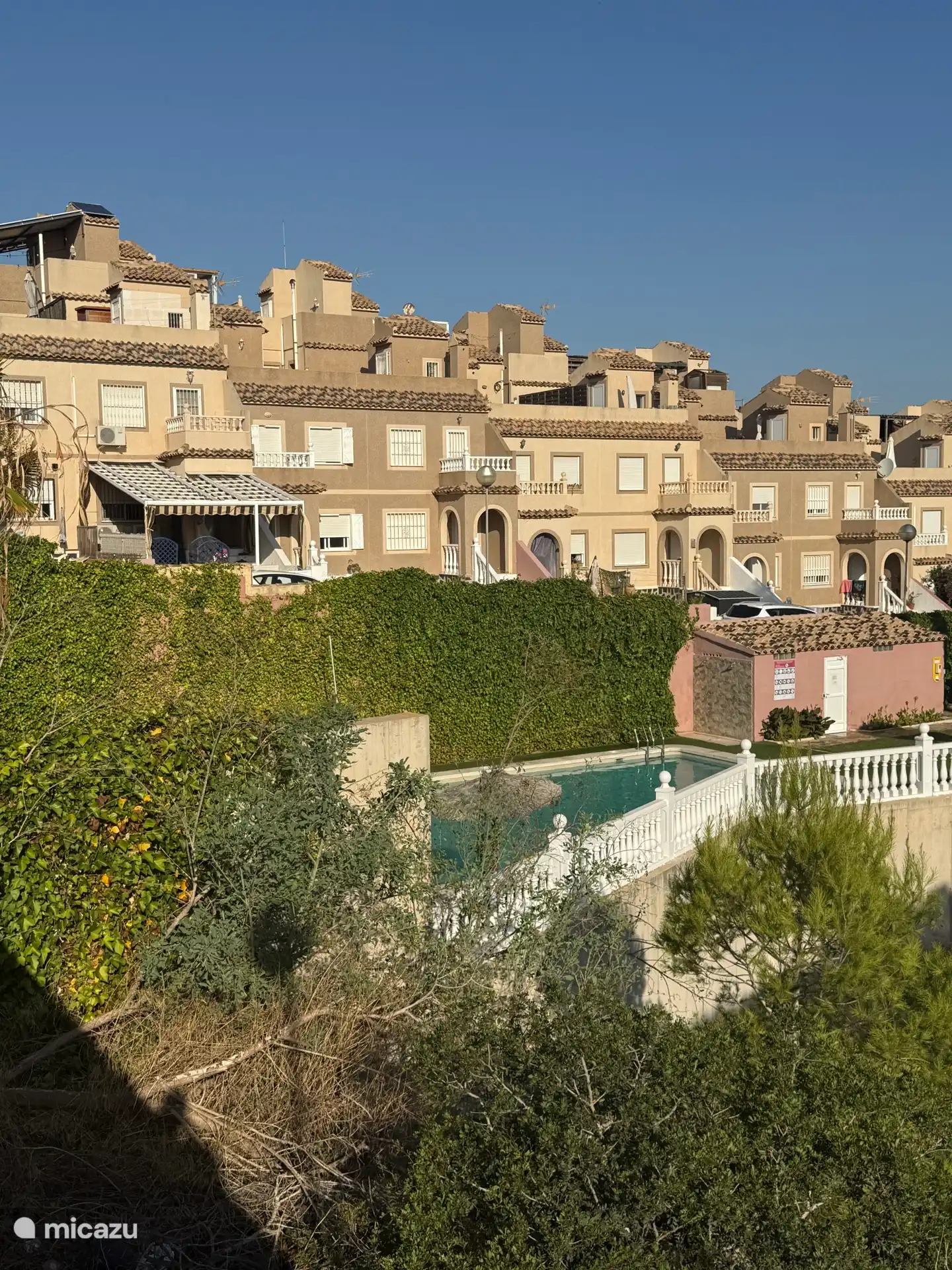 Side view of the swimming pool and streetscape