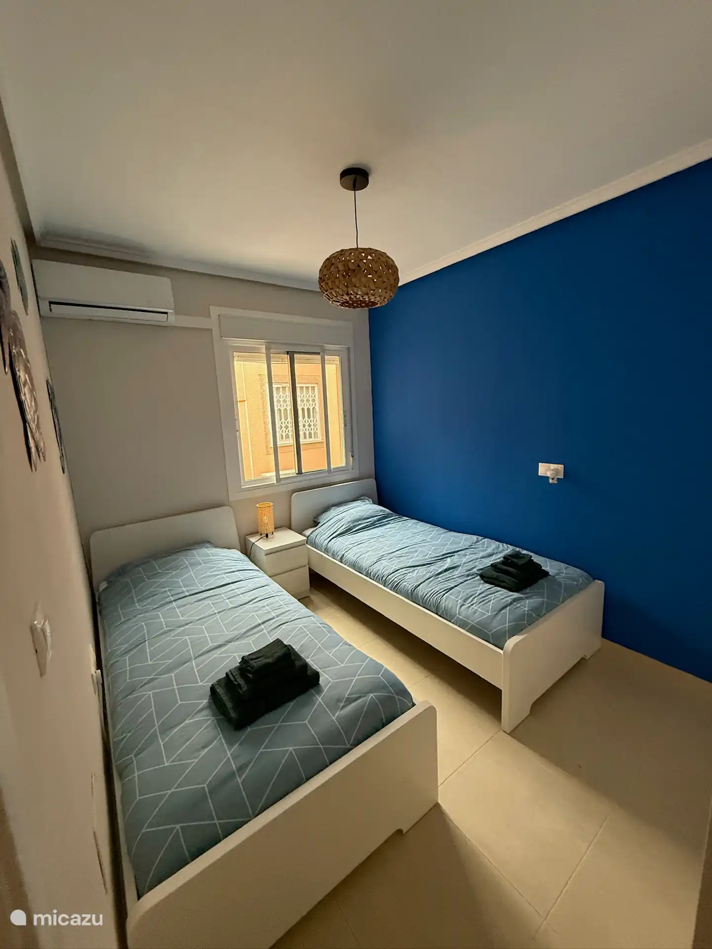 Bedroom Ocean, has 2x 1-person bed (90x200), built-in wardrobe and air conditioning