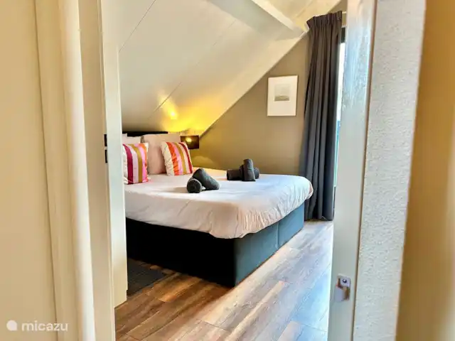 6p. Boshuis *Jacuzzi*De Groene Specht | Pays-Bas, Gueldre, Ewijk - maison de vacances Chambre à l’étage avec lit double