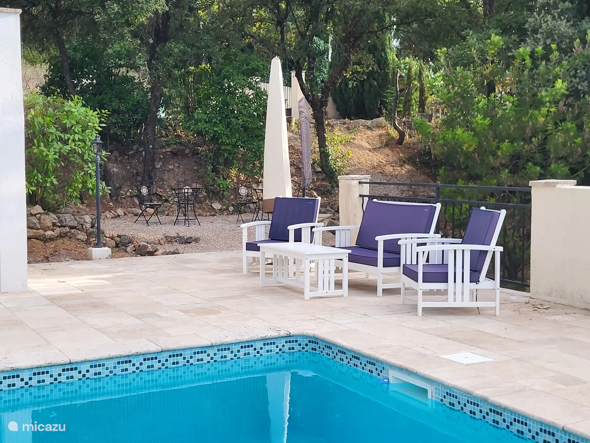 lounge set by the pool