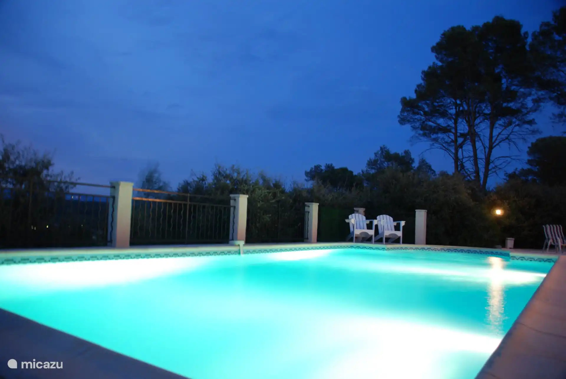 In the evening, the swimming pool is illuminated