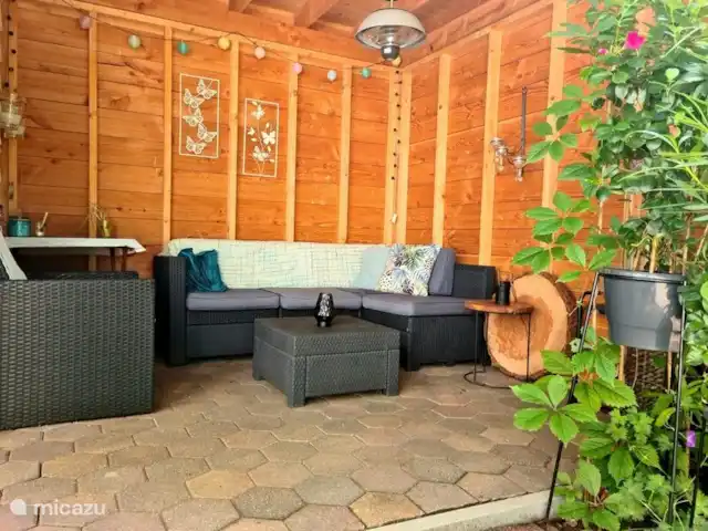chalet en Países Bajos, Güeldres, Wissel – Veluwe Coqueteo Una acogedora terraza cubierta