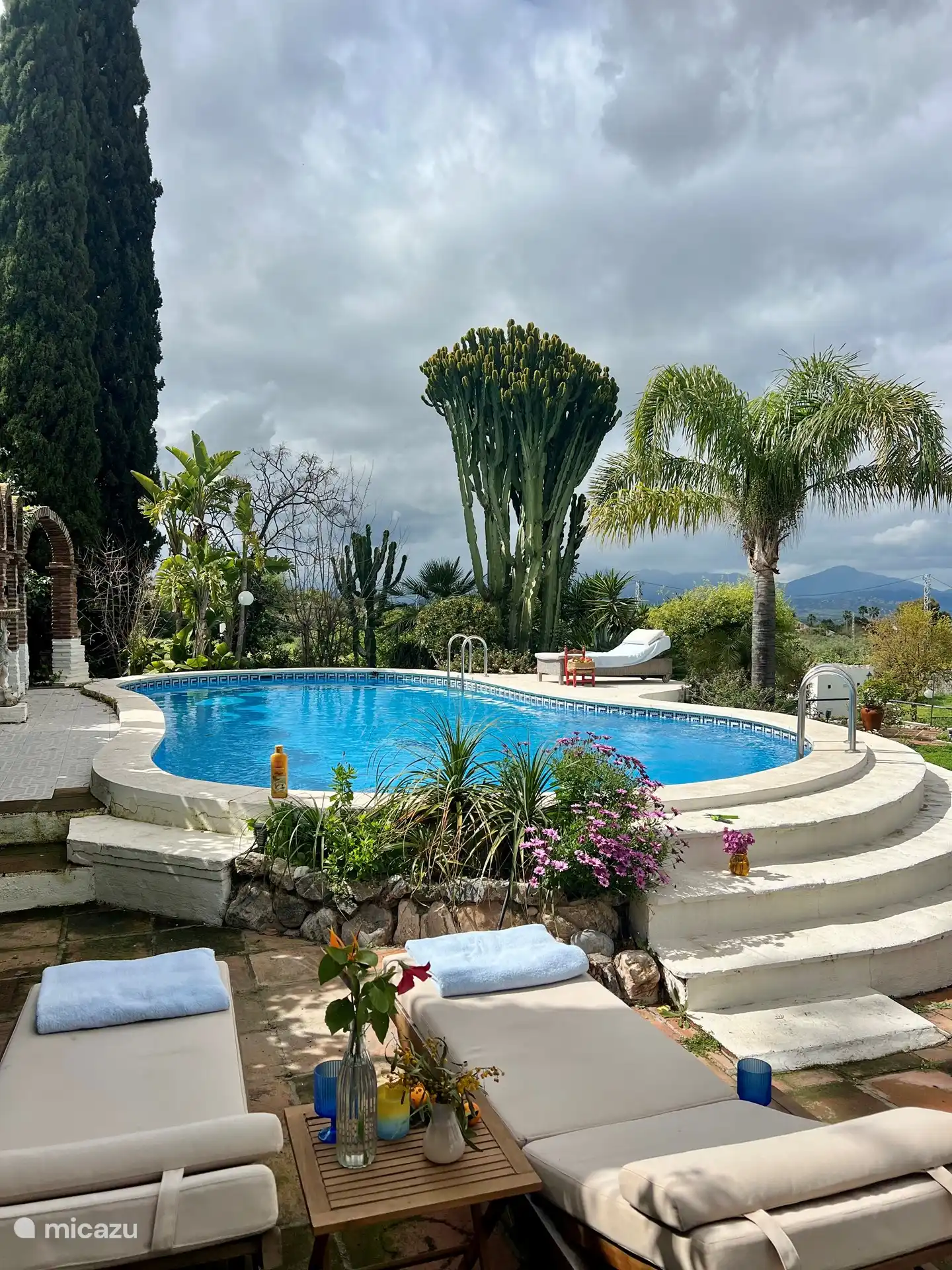 Lovely sunbathing by the pool