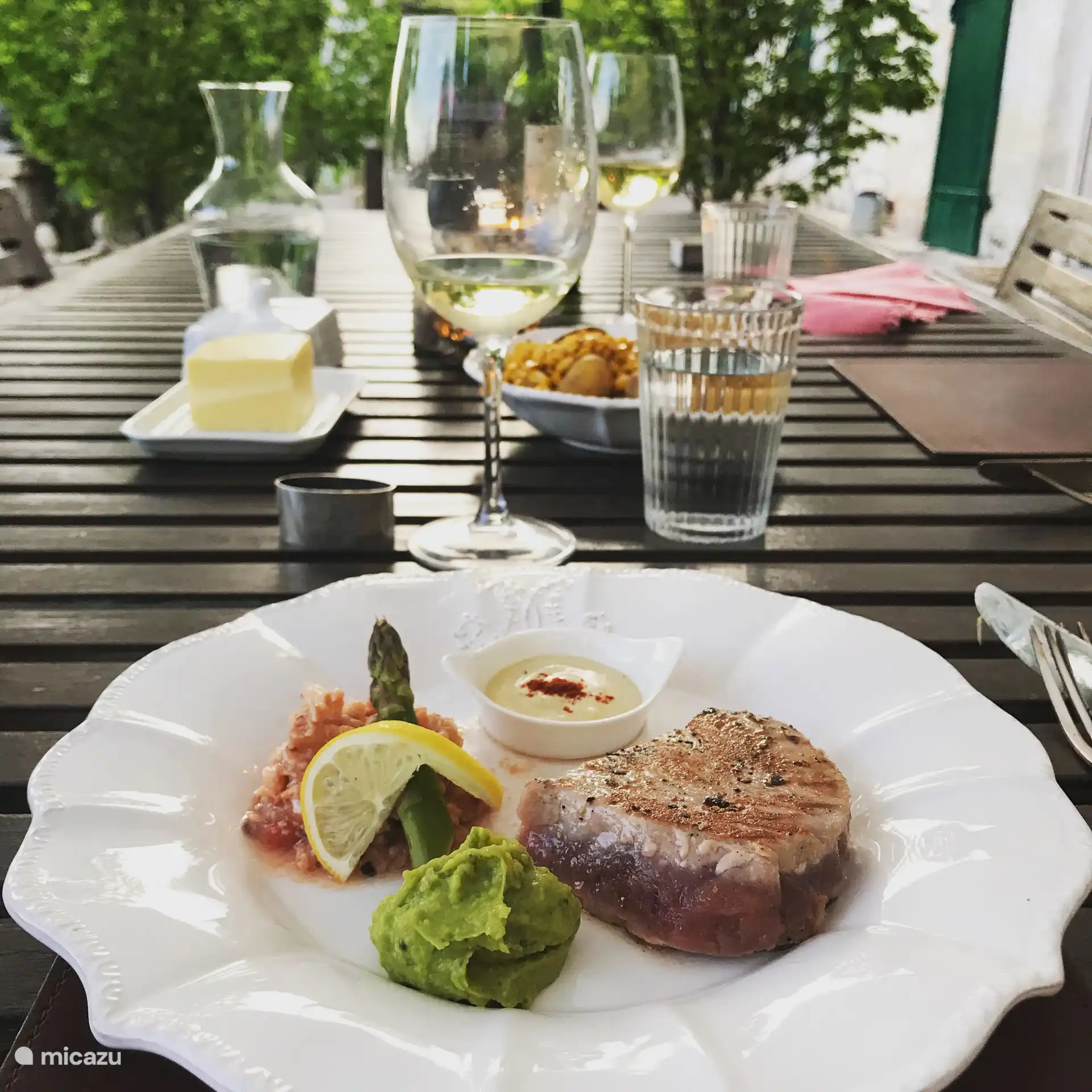 Dine on our parterre terrace overlooking the pool.  