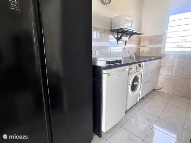 Casa Cees huren in Curaçao, Banda Ariba (oost), Santa Catharina - vakantiehuis Keuken met Amerikaanse koelkast en wasmachine.