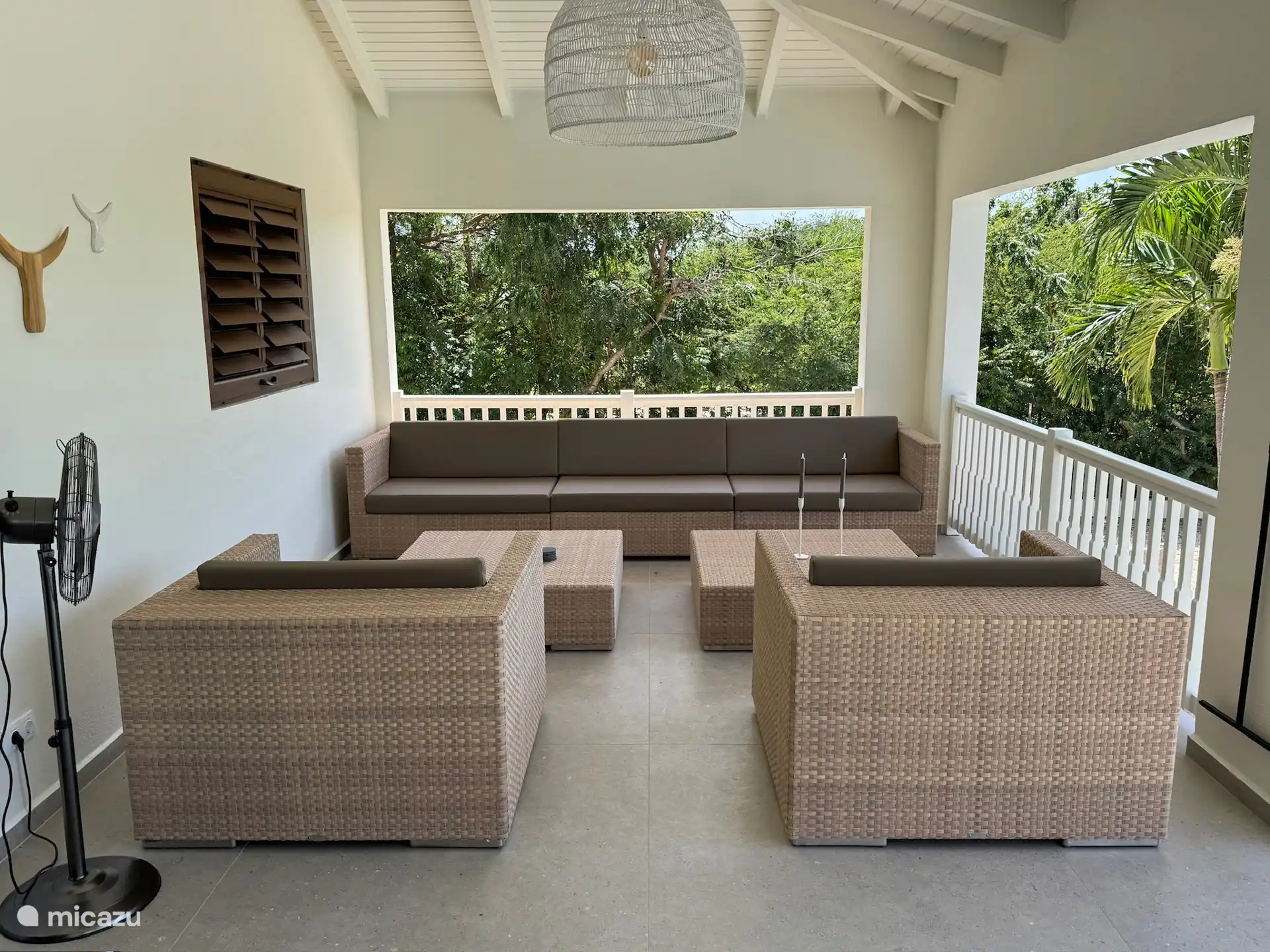 Lounge area of the veranda, with bar hatch.