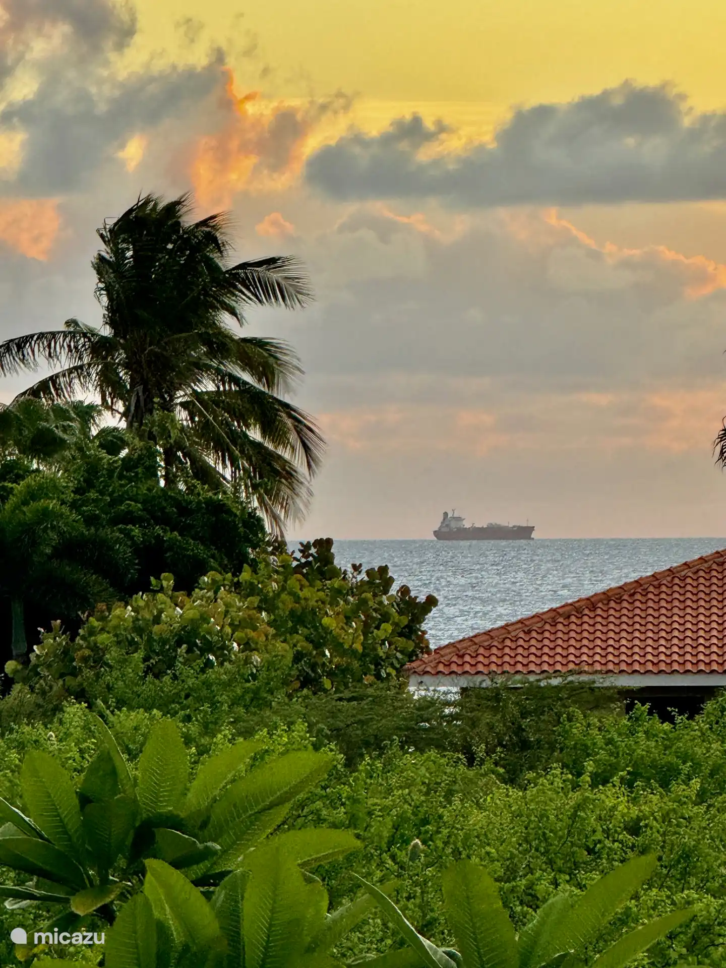 Glimpse of the ocean from the bedroom on the top floor