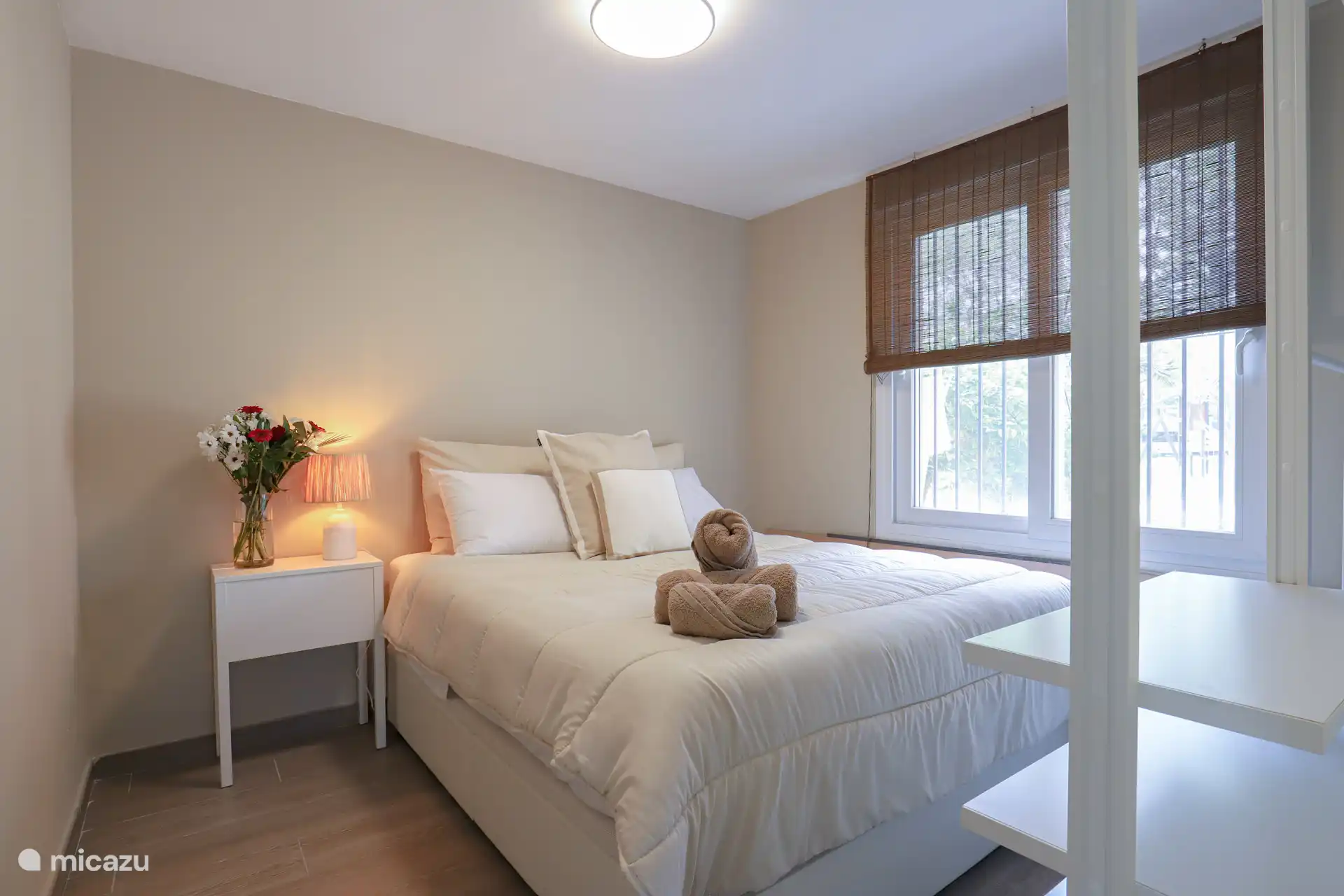 Bedroom 2, bed 150 x 190. Open wardrobe.