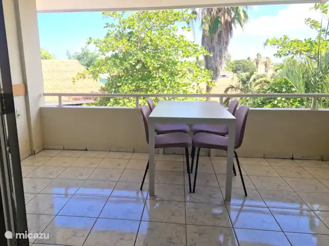 Seru Coral Resort Appartement 188 huren in Curaçao, Curacao-Midden, Koraal Partier - appartement balkon met uitzicht op tuin