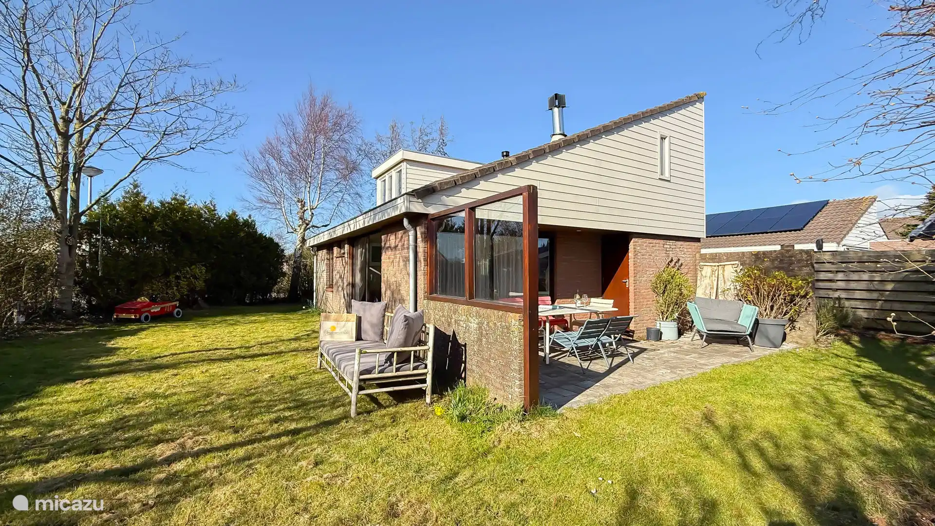 Sunny garden, surrounding the holiday home.