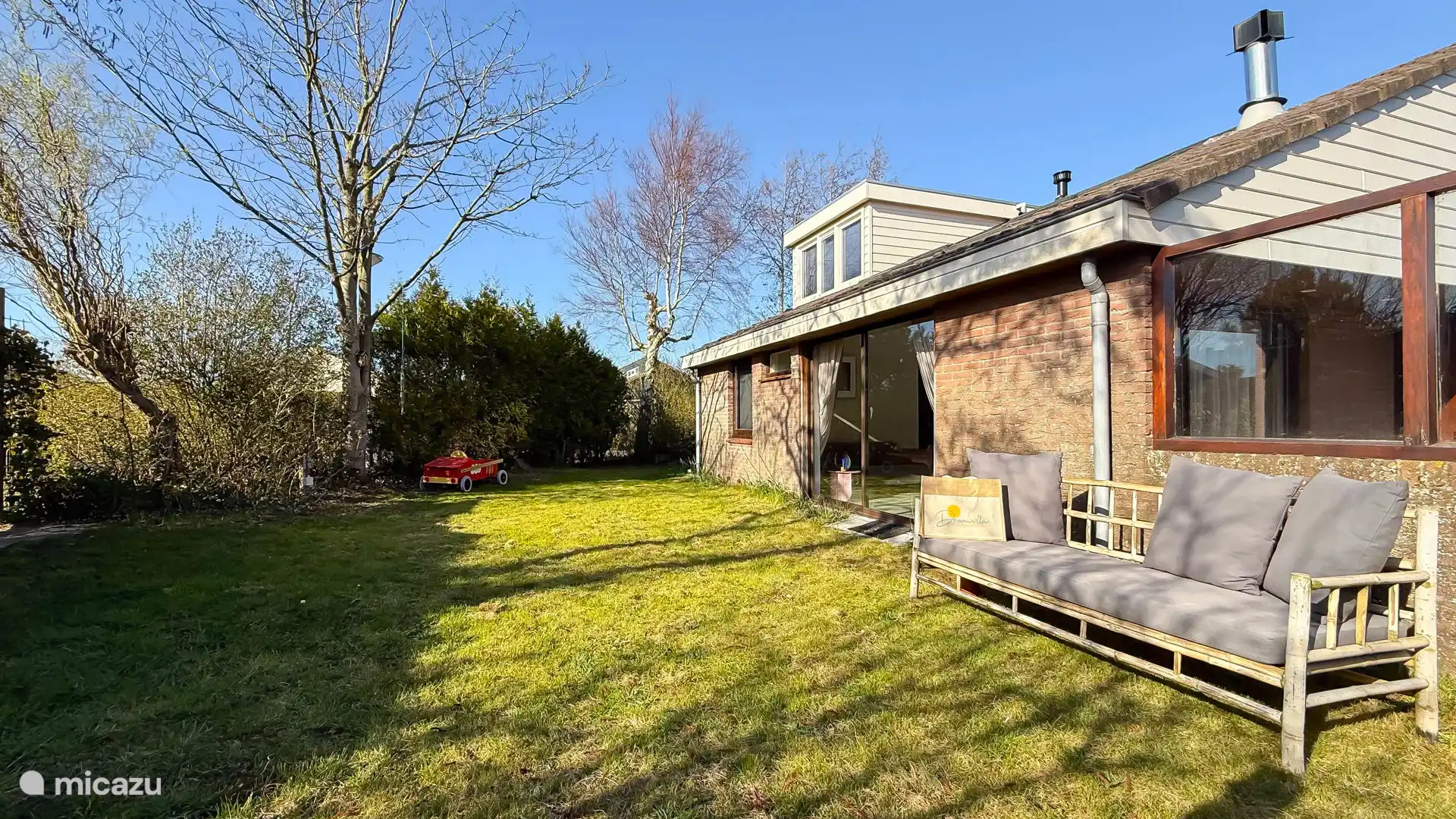 Sunny garden, surrounding the holiday home.
