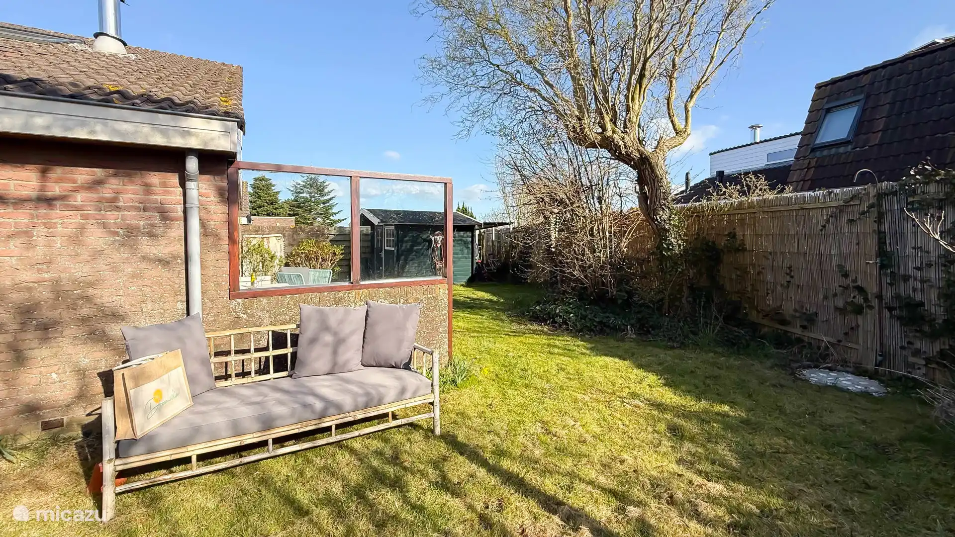 Sunny garden, surrounding the holiday home.