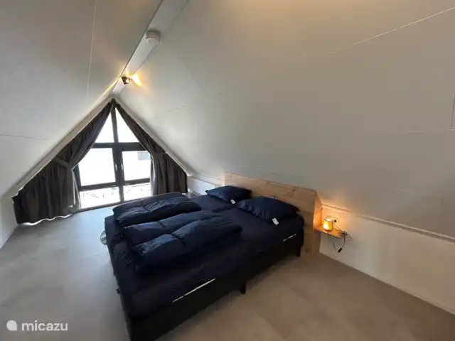 Villa de plage sur l’IJsselmeer 8 pers | Pays-Bas, Hollande du Nord, Enkhuizen - maison de vacances Chambre 3 avec une vue magnifique sur l’IJsselmeer.