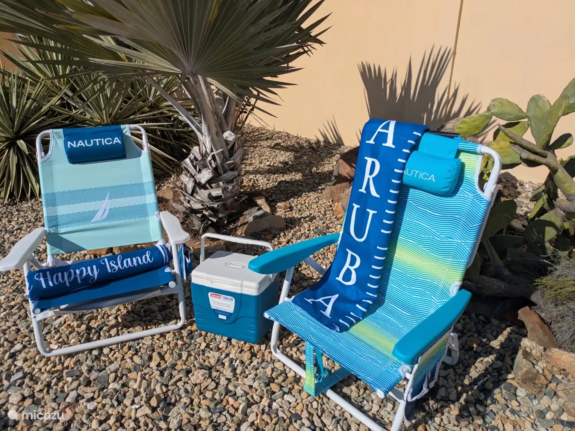 2 beach chairs, beach towels and cool box