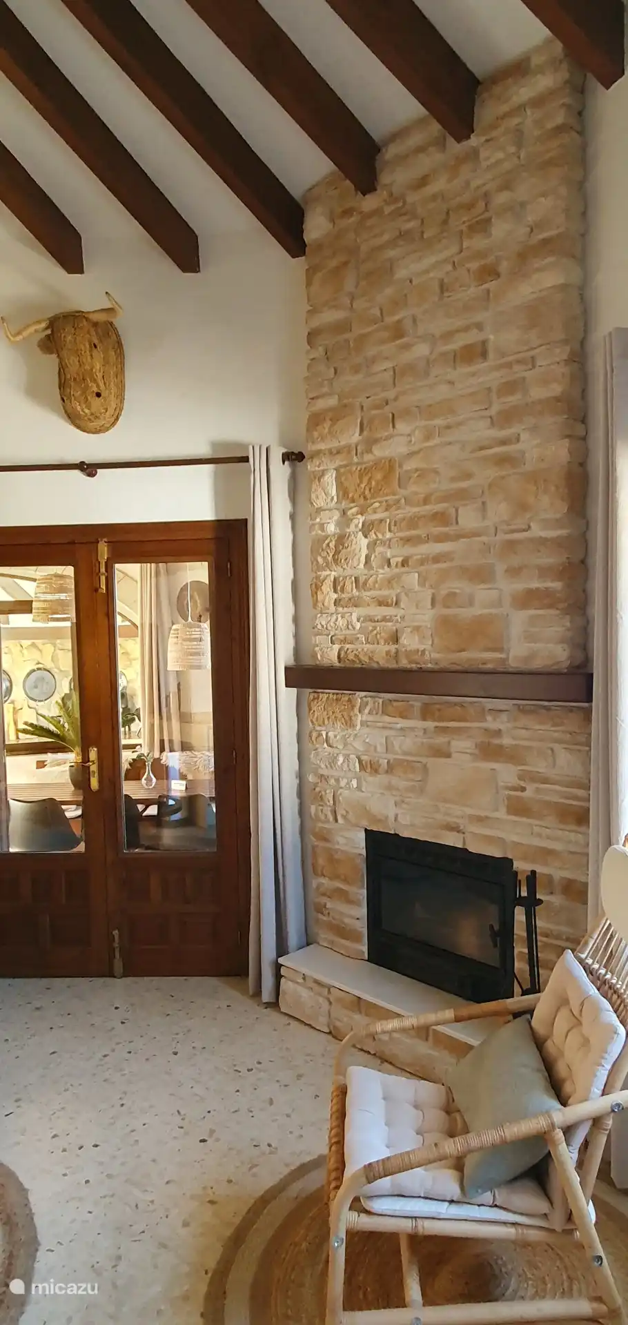 Living room with view to conservatory