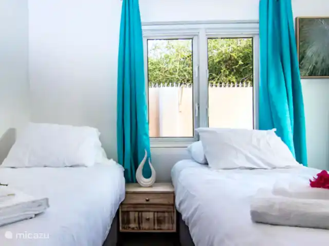 Apartamento Beach Life 11/K en Curazao, Banda Arriba (este), Jan Thiel - apartamento El segundo dormitorio con 2 camas individuales. Puede solicitar tener esto como 1 cama queen durante el tiempo de reserva.