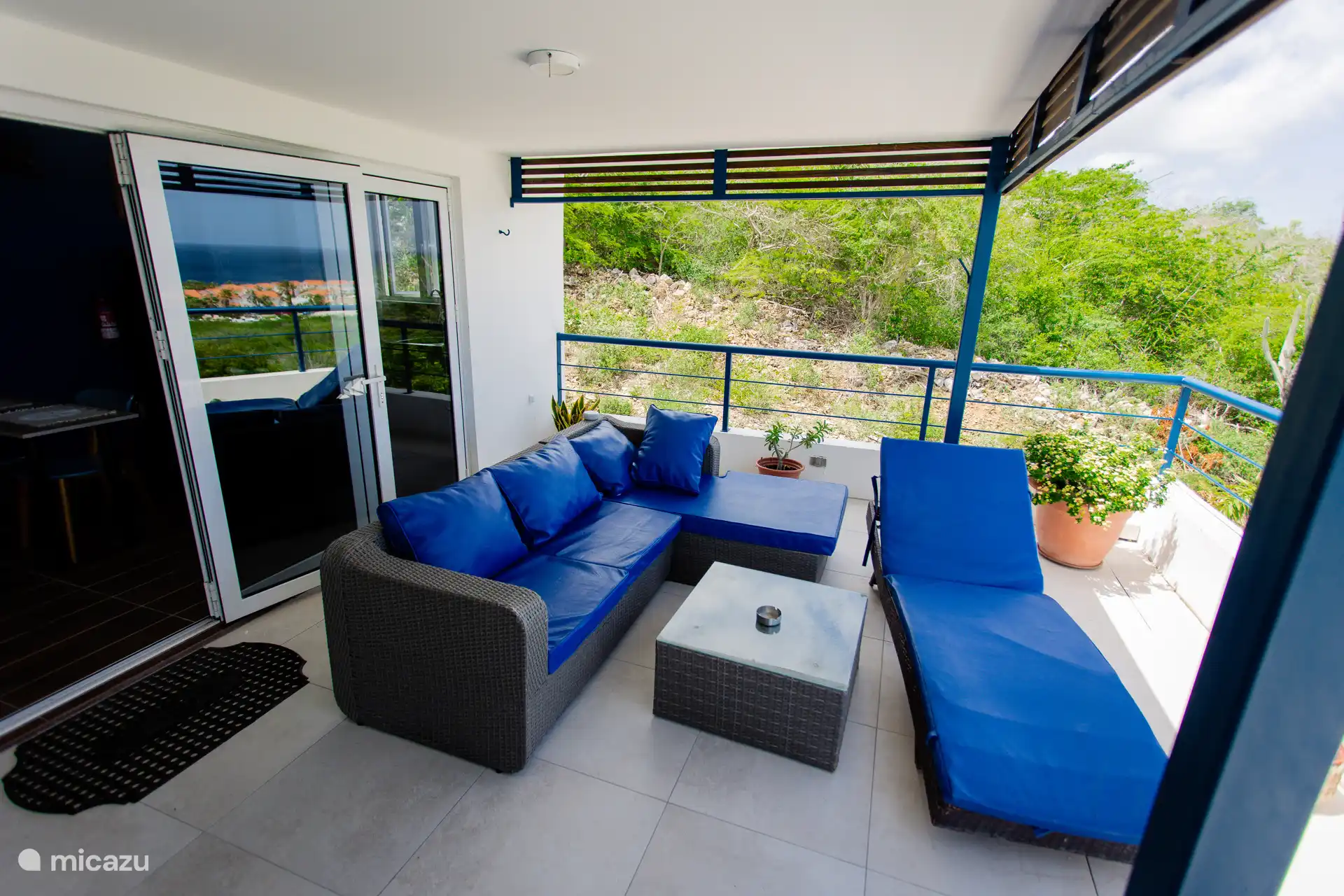 Your own private seating area right outside the apartment with a peaceful nature view and fresh air.