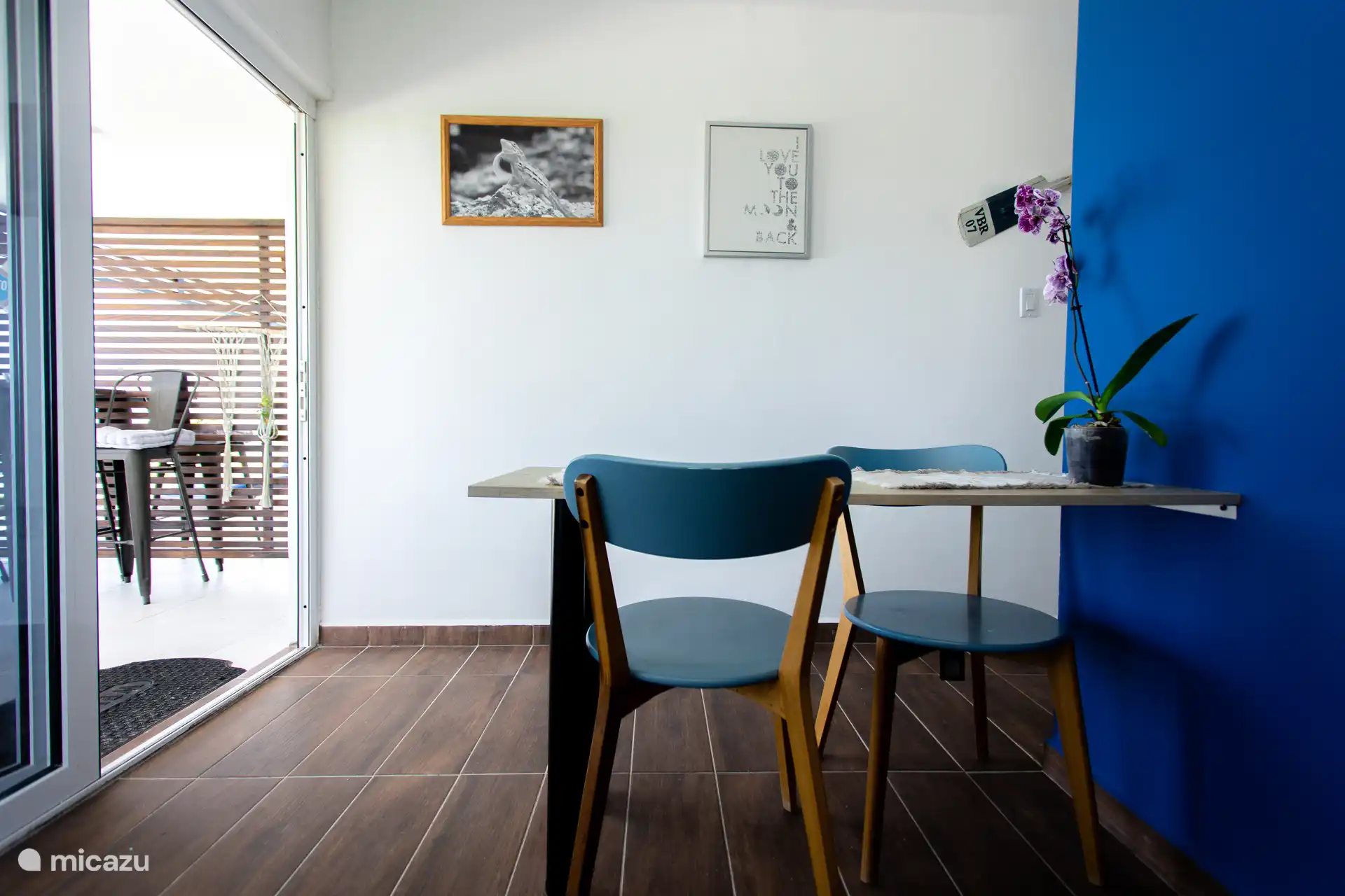 Fully equipped kitchen with fridge, stove, microwave, coffee maker, and all basic cookware.