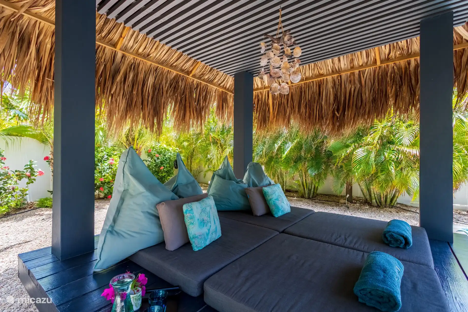 A lovely palapa to relax in the shade next to the pool