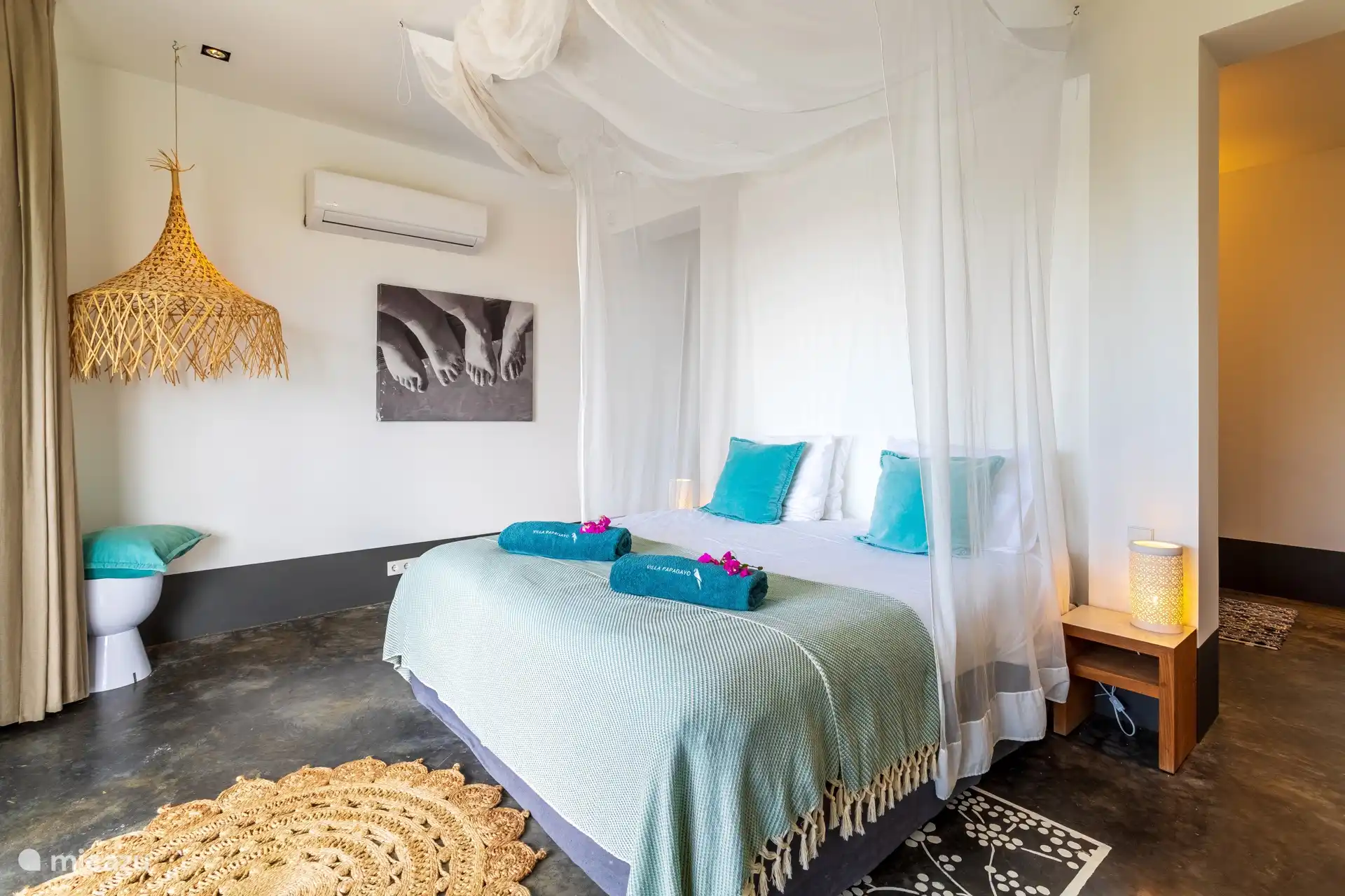 The master bedroom has an ensuite bathroom with shower and toilet with ample closet space, a safe and AC. 