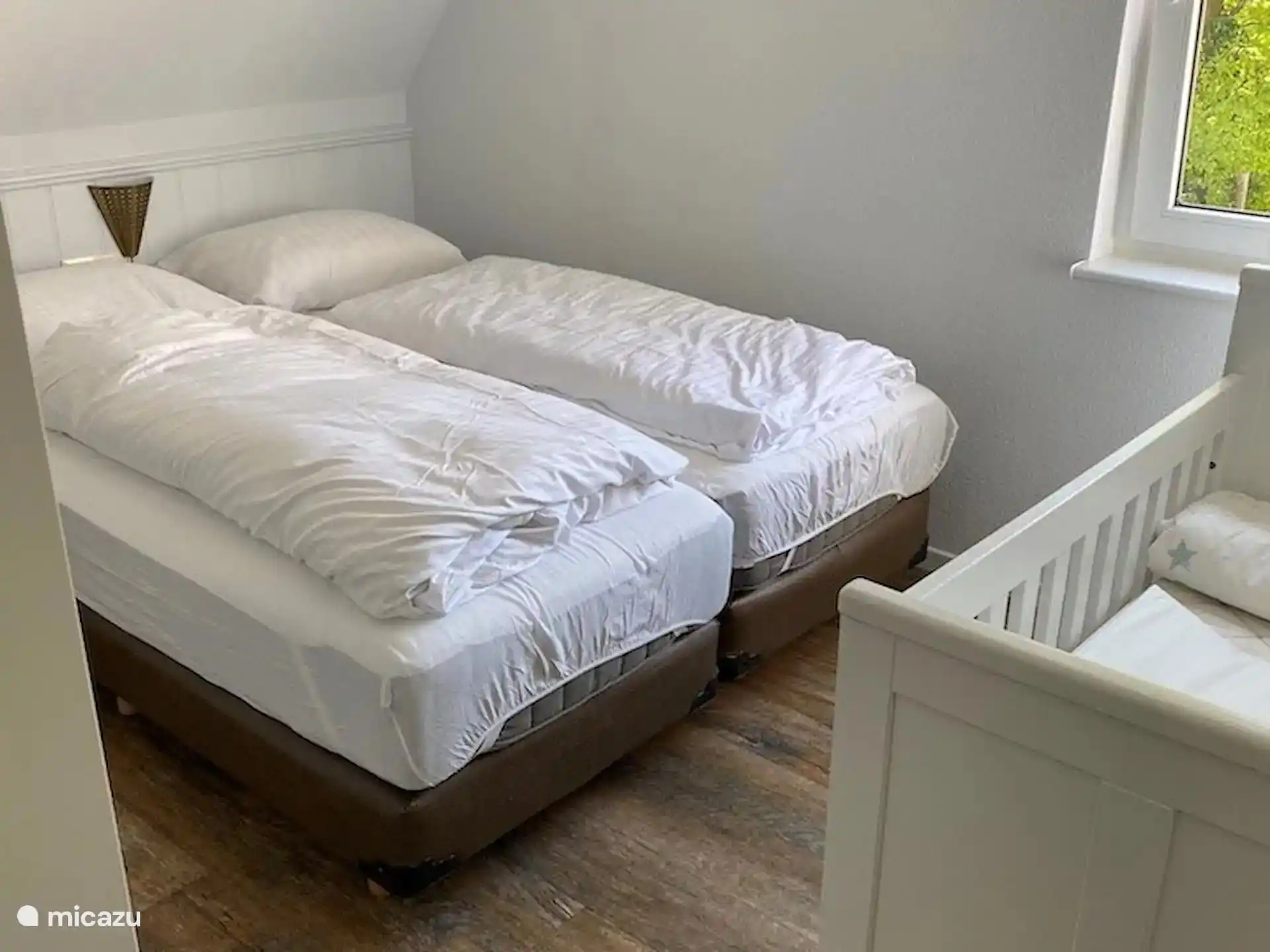 2 person bedroom upstairs with cot