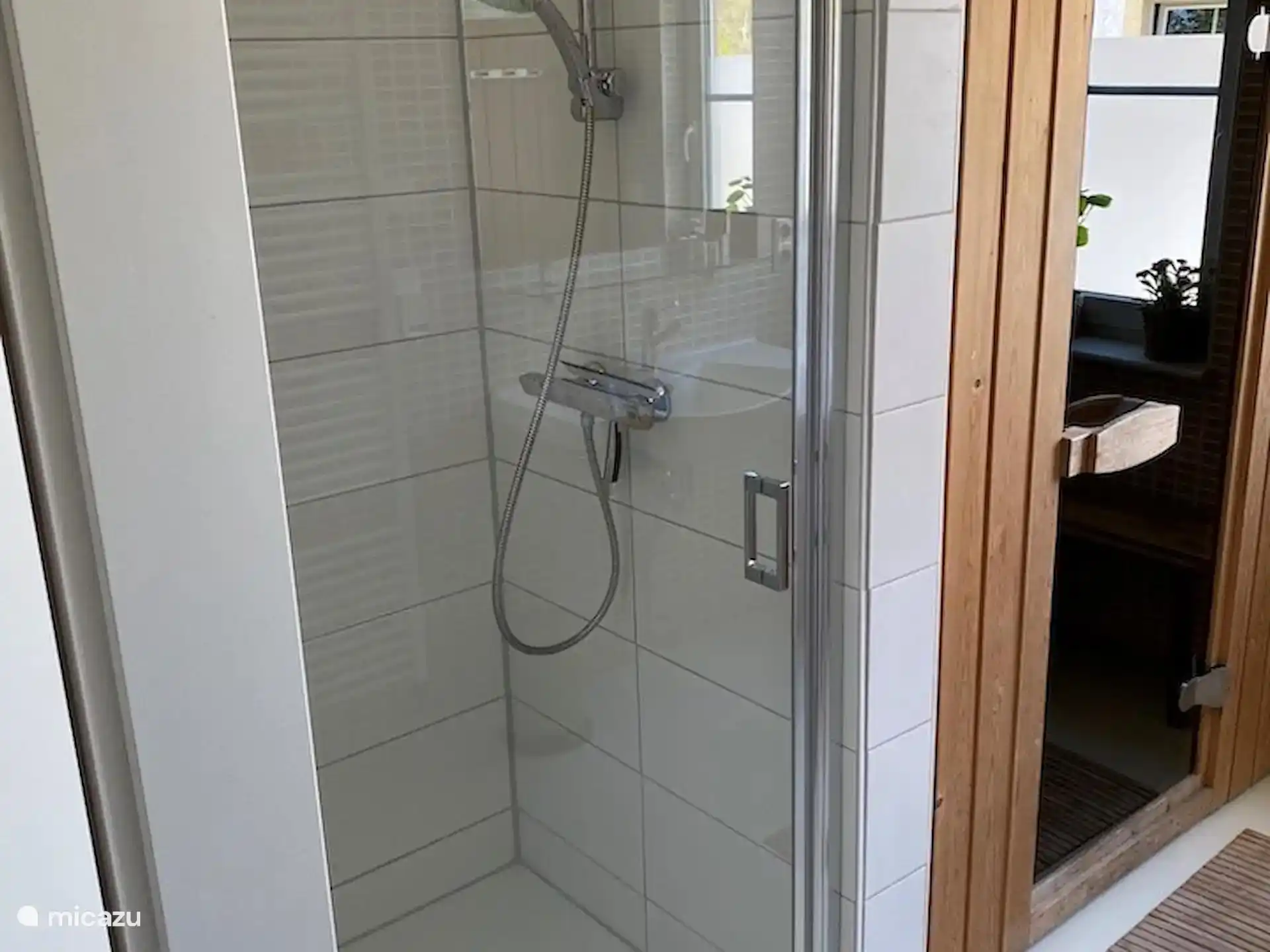 Upstairs shower with sauna