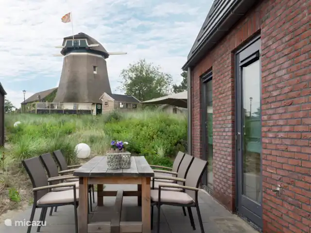 Rayons de soleil | Pays-Bas, Hollande du Nord, Egmond aan den Hoef - maison de vacances Ensemble de jardin avec vue sur le Moulin d’Egmond