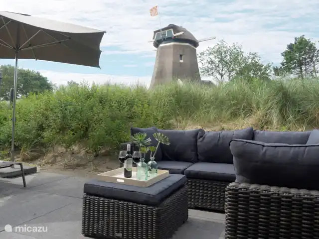 Rayons de soleil | Pays-Bas, Hollande du Nord, Egmond aan den Hoef - maison de vacances Salon avec vue sur De Molen van Egmond