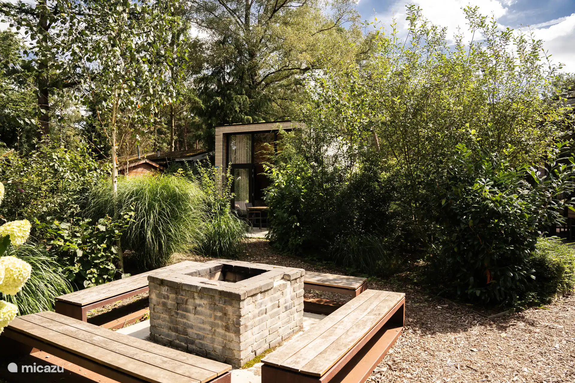 Gedeelde vuurplaats met uitzicht op de tiny house