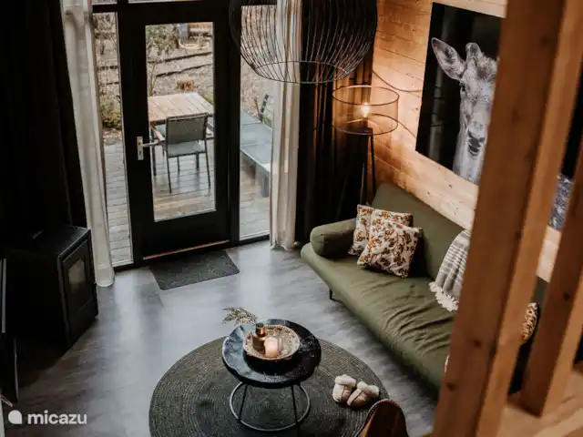 casa pequeña  en Países Bajos, Güeldres, Beekbergen – Veluwe Tiny House Sala de estar desde el altillo