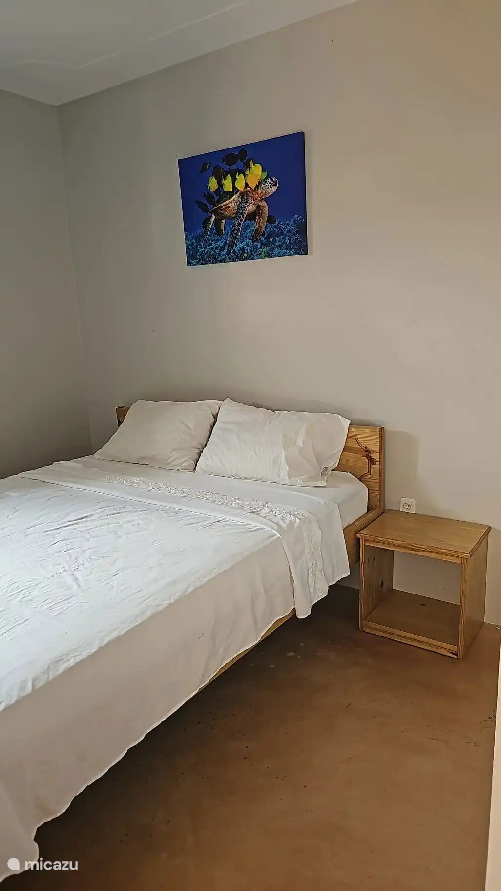 The bedroom has a double bed