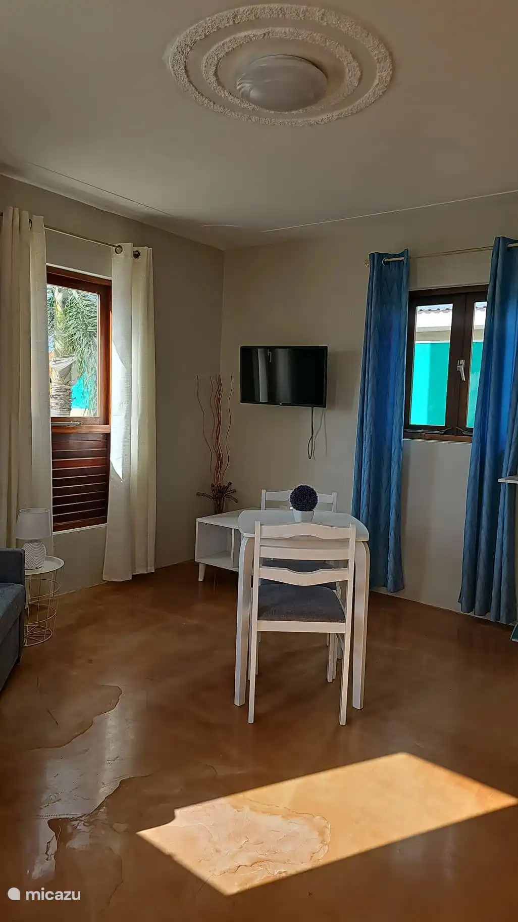 Present: TV with various international channels including Netflix