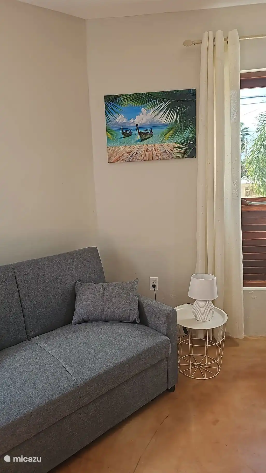 There is a sofa bed available for relaxing TV watching