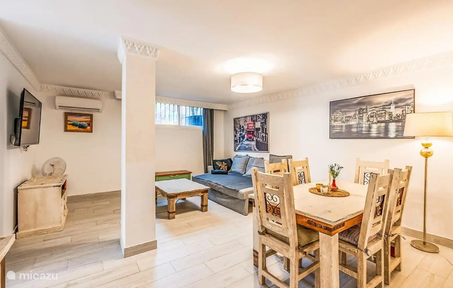 ground floor bedroom with 2 single beds and a double sofa-bed