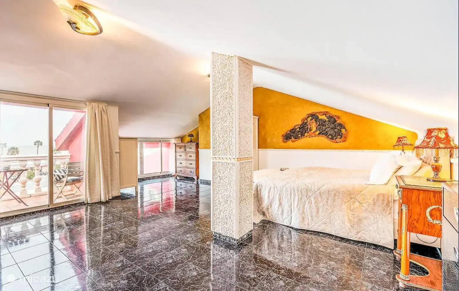 bedroom 7 with a balcony and a sea view