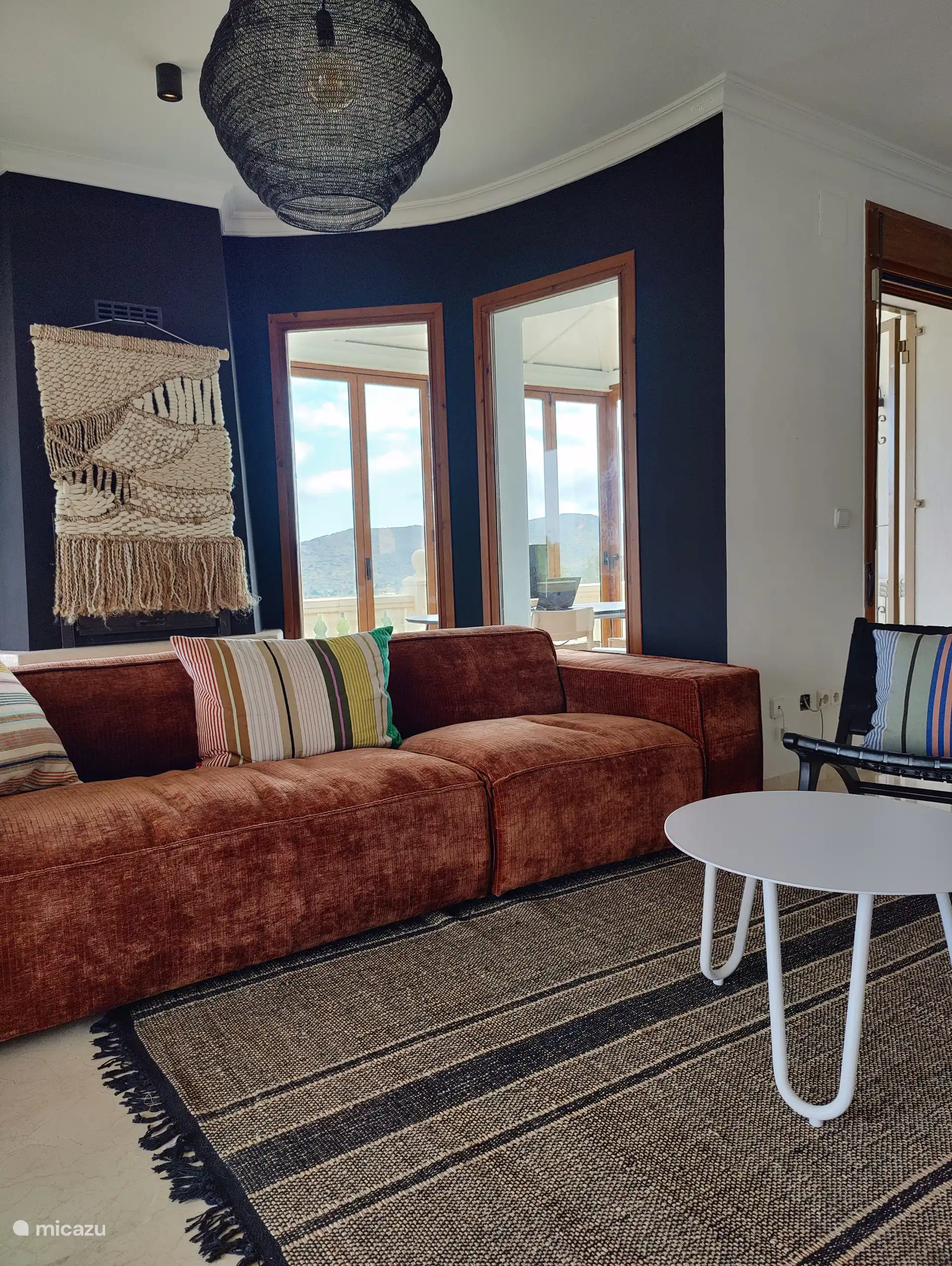 Cozy lounge with spacious, comfortable seat.