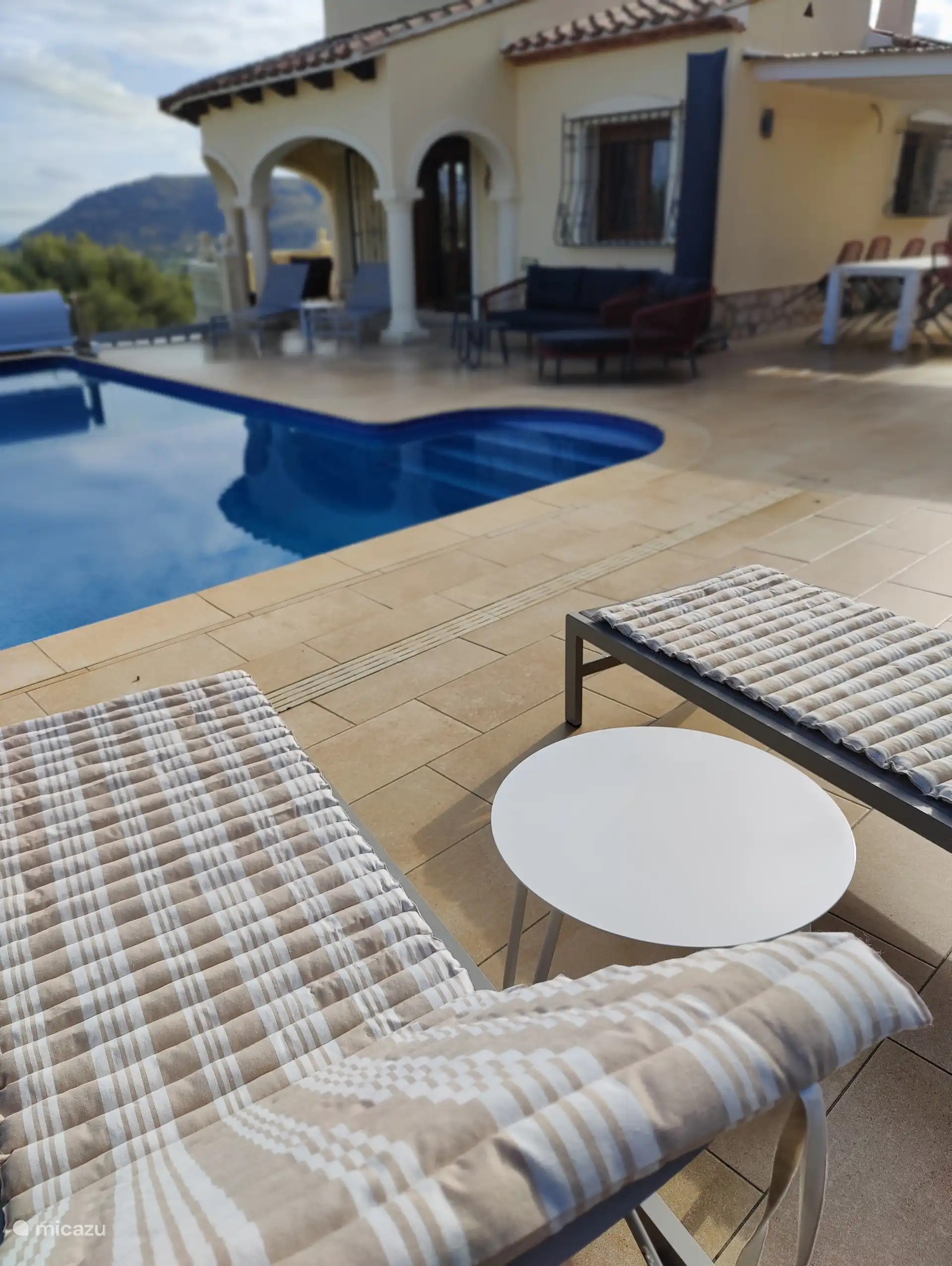 Blissful sunbeds to relax by the pool.