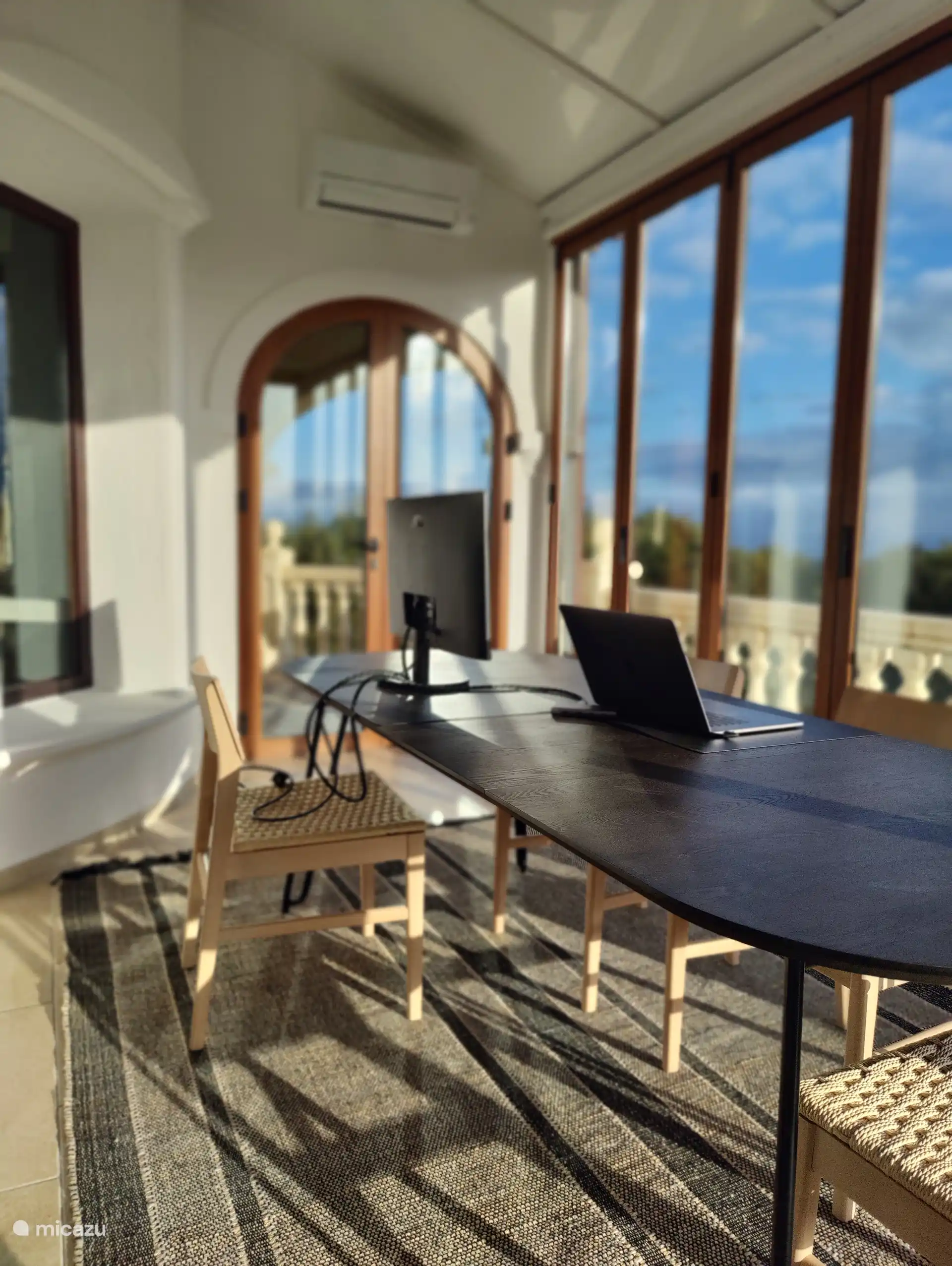 Spacious veranda - workplace or dining area.